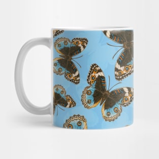 Blue Pansy Butterfly pattern on blue Mug